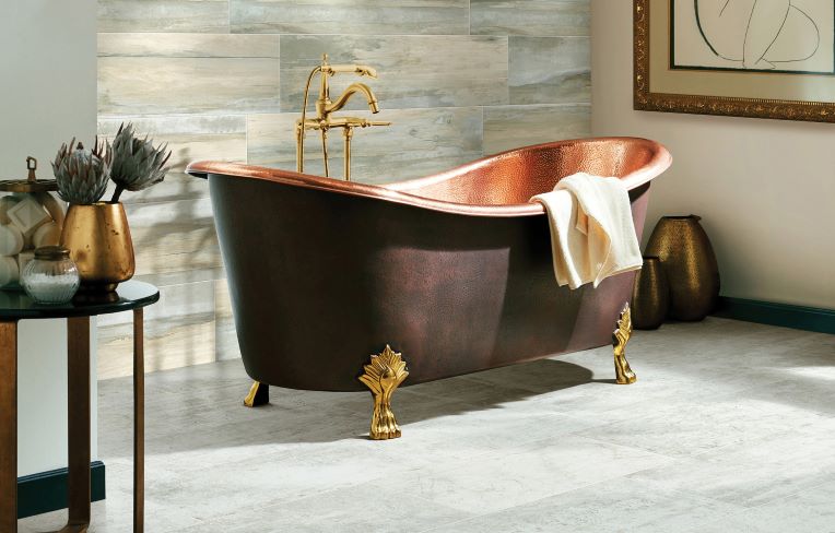 beautiful bathroom design with tile flooring and freestanding copper tub